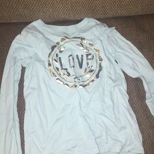 gold and blue long sleeve t-shirt